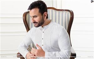 Saif Ali Khan looks charming as he strikes a decent pose in a white kurta